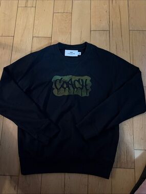Costume Black Crewneck Sweatshirt with Olive Logo